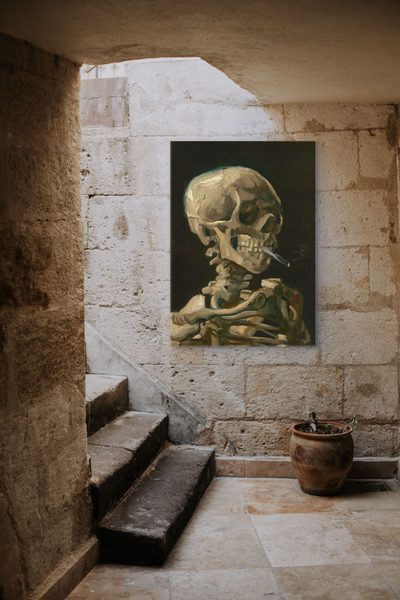 Head of a Skeleton with a Burning Cigarette by Vincent van Gogh as a framed print in a hallway